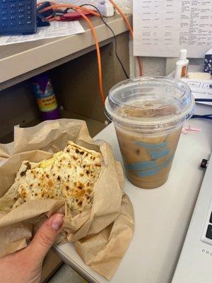 Vegan flatbread breakfast sandwich and an iced coffee!