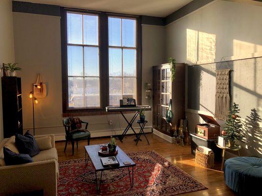 Fantastic light and HIGH ceilings. Original built-in cabinet for classroom books.