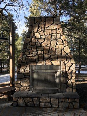 Outdoor front-venting gas fireplace.