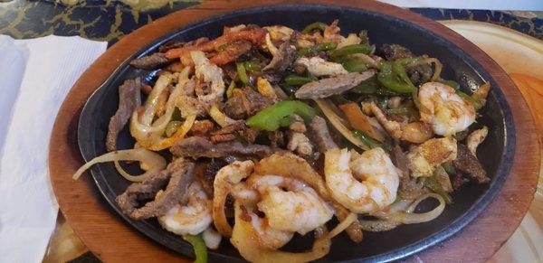 Chicken, steak and shrimp fajitas