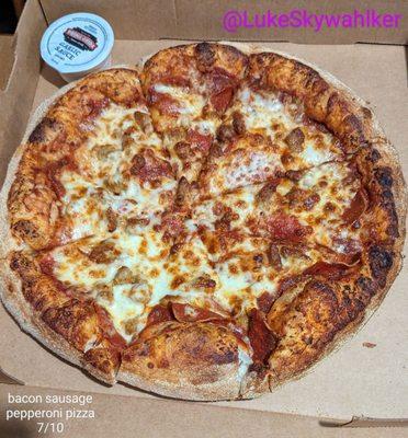 Medium bacon sausage pepperoni pizza