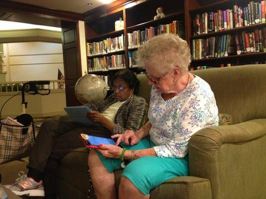 Seasons residents staying up to date with technology by learning how to use an iPad. One was even sending her very first email!