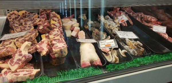 Oxtails, cow feet, goat and lamb