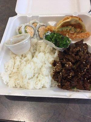 Bento box. Served with 4 California rolls, veggie tempura, seaweed salad and rice. Beef