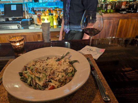 The scratch duck pasta with a nice glass of wine.