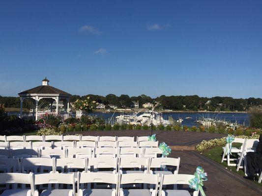 Ceremony set up on the lawn. Gorgeous view!