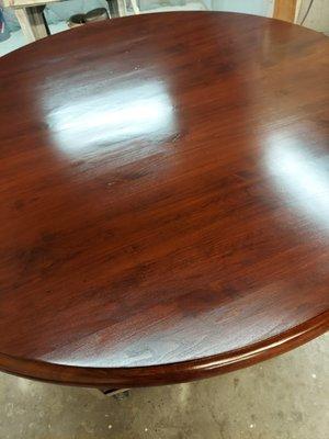 A beautiful 60" round table refinished