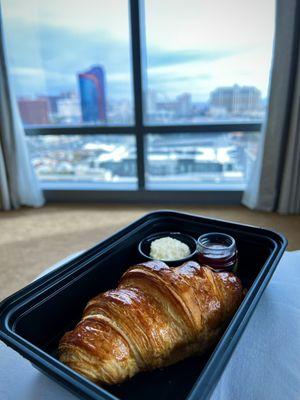 Croissant with jam & butter. Fresh & delicious.