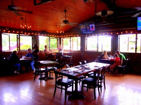 One of the dining areas with socially distanced tables