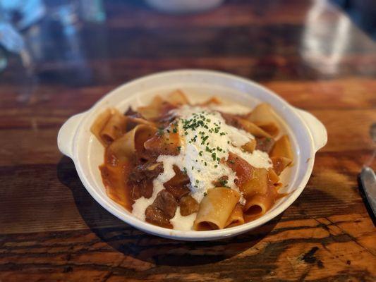 PAPPARDELLE WITH SHORT RIB SUGO, GARLIC, ONION, TOMATO AND HORSERADISH CREMA