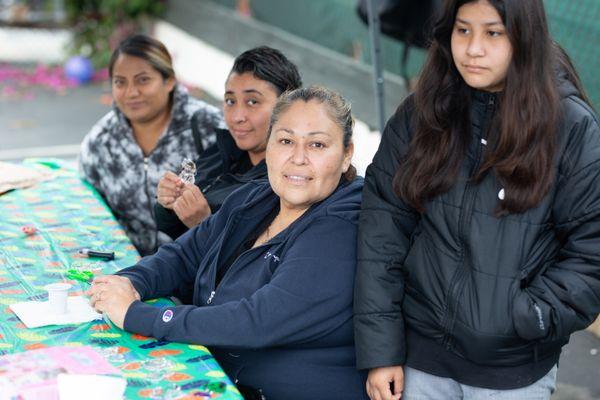 One of our families helping with the crafts at our neighborhood block party