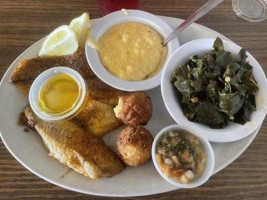 Catfish filets blackened with cheese grits and collard greens