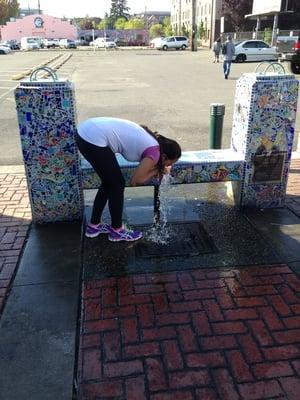 Tasting the well water.