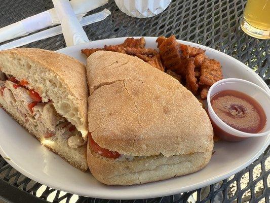 Chicken pesto sandwich with sweet potato fries