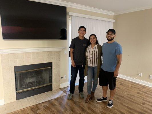 Our realtor (closest to fireplace), Anthony Duarte, did a great job helping us find our first home!