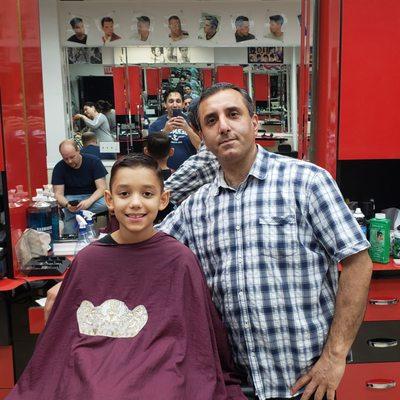 My son and his barber.