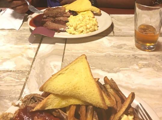 Beef brisket plate with Mac n cheese and pulled pork with fries