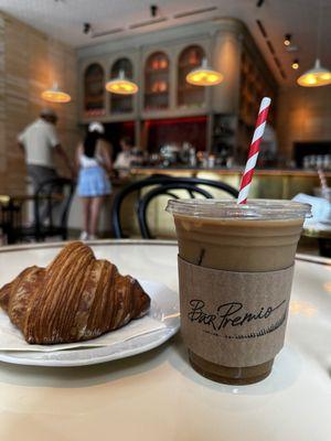 Iced Oat-milk Latte with a buttered croissant