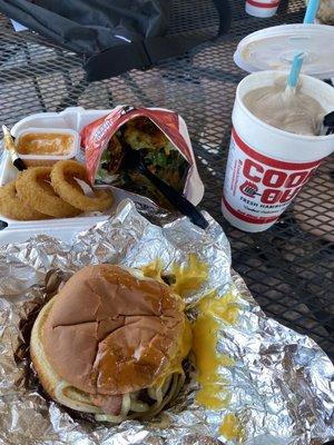 Double burger cheddar style with onion rings , walking taco and chocolate malt