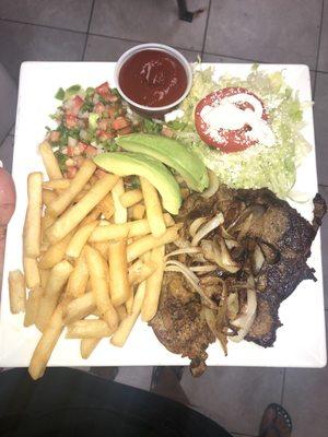 Carne asada (sub rice with fries) picó de gallo, avocado and fresh salad