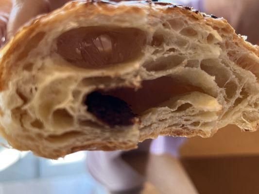 See the one little speck of chocolate in this grossly chewy pain au chocolat? We can't either...