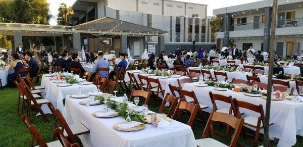 brown chairs against the green grass looks so nice