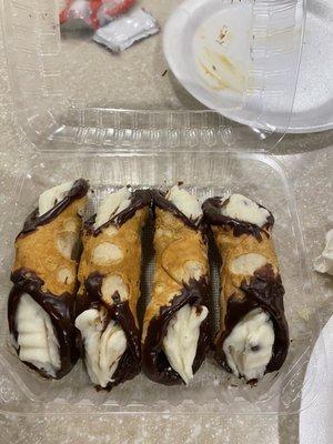 Cannolis with ends dipped in Nutella. Not bad for 10 bucks for 4.