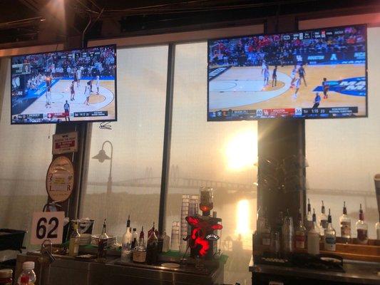 Bar with The Fred Hartman Bridge in the background.