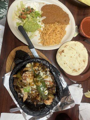 Super Molcajete with beef, chix, and shrimp eaten taco style.