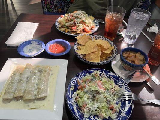 Shrimp Enchiladas and Chicken Nachos today, Chicken Adobe Enchiladas prior. Great stuff.