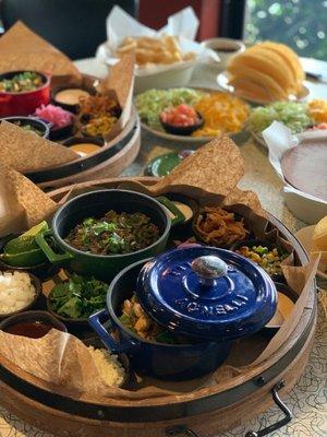 Taco Bar Tuesday- a spinning wooden tray filled with fresh toppings! Minimum 2 orders per table. Available Tuesdays, in Grapevine only.