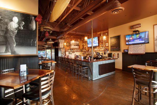 Interior photo of the Lisa's Cantina "side" at Jim & Rob's Fresh Grill Ojai. The Cantina has 5 large HDTVs for sports fans.