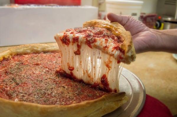 Deep Dish Cheese Pizza at Faustino's Italian Pizzeria in Lowell! You can see all the cheese and how the crust stayed firm.