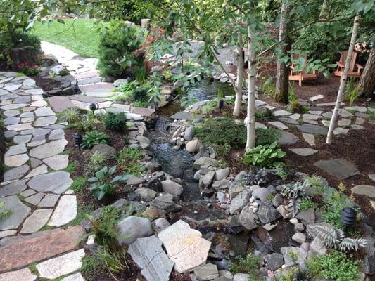 Joan C. view from deck looking down to back pond and streambed.