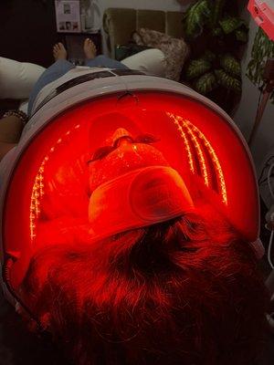 Red light therapy for rejuvenation and product penetration during facial