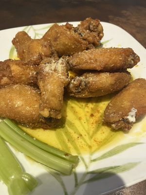 Garlic Parmesan wings in a pool of grease