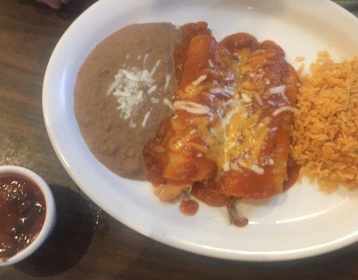 Red sauce chicken and brisket enchiladas