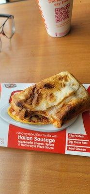 Italian sausage pizza Puff. This station carries the whole line of them available through the day into the early afternoon