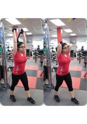 Ninette is  performing low pulley tricep extension.