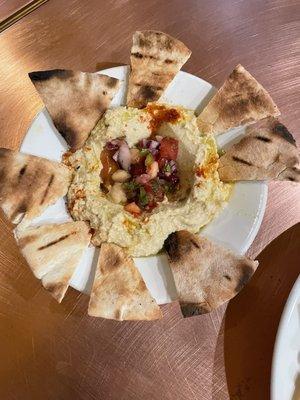 Personal (taste test position) size hummus and toasted pita. Your plate will be large.