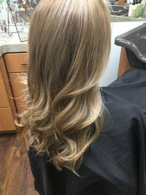 trim and blonde highlights