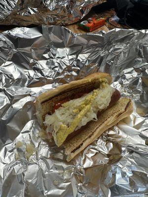 NY dog with kraut, mama lil's, and spicy mustard