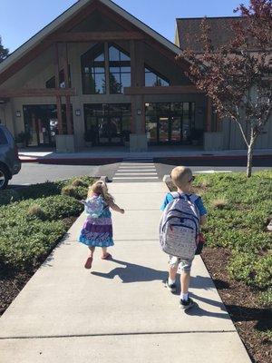 Arriving at preschool pre-pandemic. My kids were always excited for class!