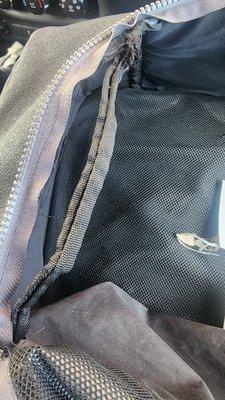 Piping was not sewn and thread is hanging everywhere. This is just one location of the backpack.