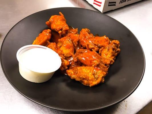 Try our special wings cooked to perfection with just the right amount of sauce !