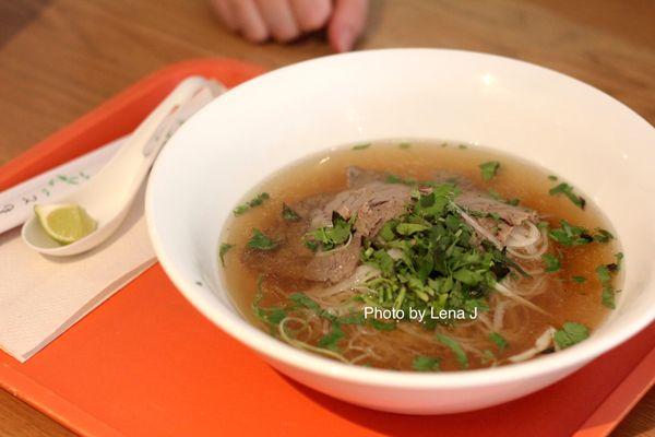 Beef Pho ($11) - Rice noodle, thin sliced beef, onion, scallion, cilantro, basil, lime, beef broth