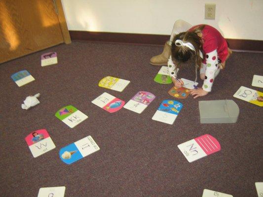 Sorting alphabet cards and writing words that start with that letter!  Hard work going on in our Prek class.