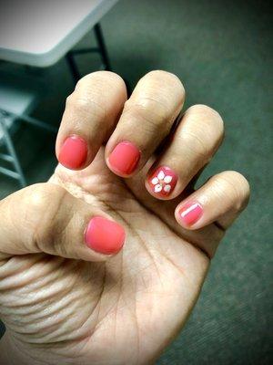 Hands after green tea manicure are soft and well hydrated. Regular manicure with a flower design, perfect for my trip to Florida!