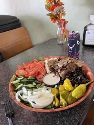 Gyro salad was massive and delicious! Customer service was wonderful. The place is so sweet! Menu made us want to eat everything on it!