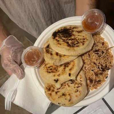 Try Our Pupusa Flight!
 3 Pupusas of your choice w/ Rice, Pickled Slaw, Salsa. Salvadorian Crema is optional.